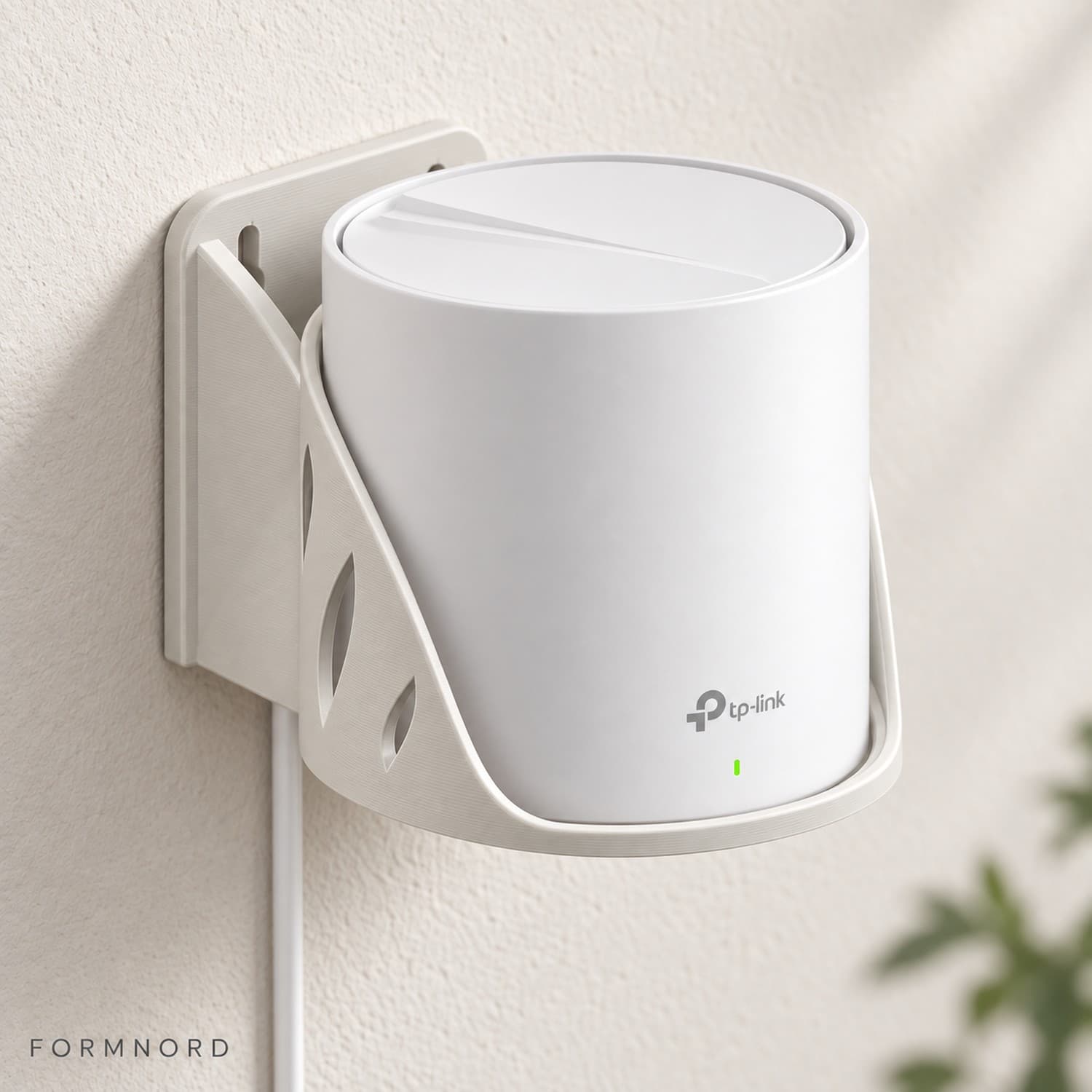 FormNord veggholder med en TP-Link Deco montert pa vegg
